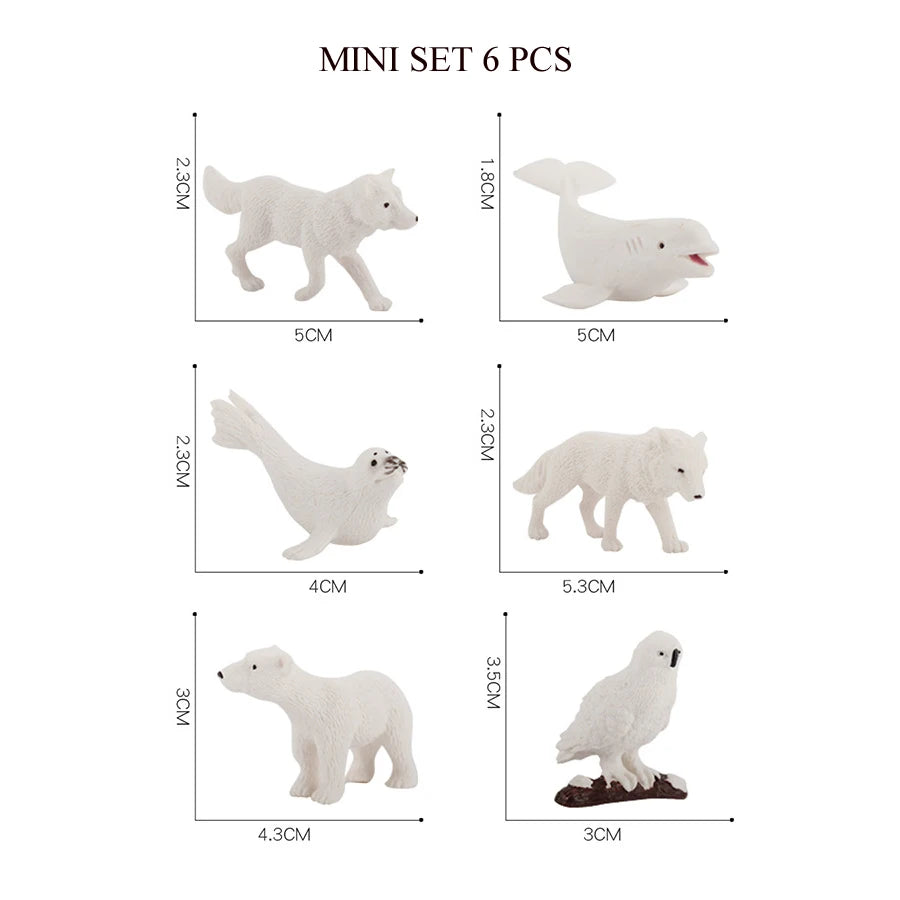 A mini set of six white animal figurines including a whale, shark, dolphin, turtle, and penguin.