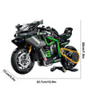 A black and green classic 1:8 scale motorbike building blocks set displayed on a stand.