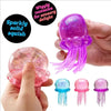 A hand holds a purple squishy toy with tentacles, demonstrating its soft water sensory features.