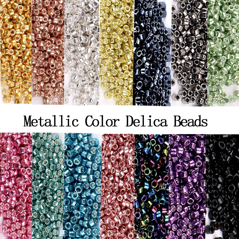 A collection of metallic color delica beads in various shades including gold, copper, silver, and green.