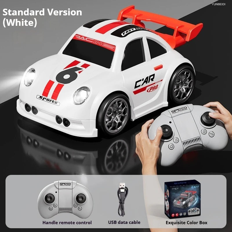 A white racing RC car is shown next to a hand holding a remote control and an exquisite color box.