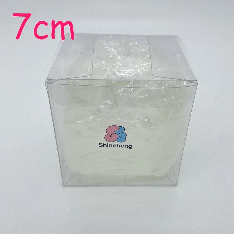 A clear plastic squishy stress ball with a lid, measuring 7cm, for relaxation.