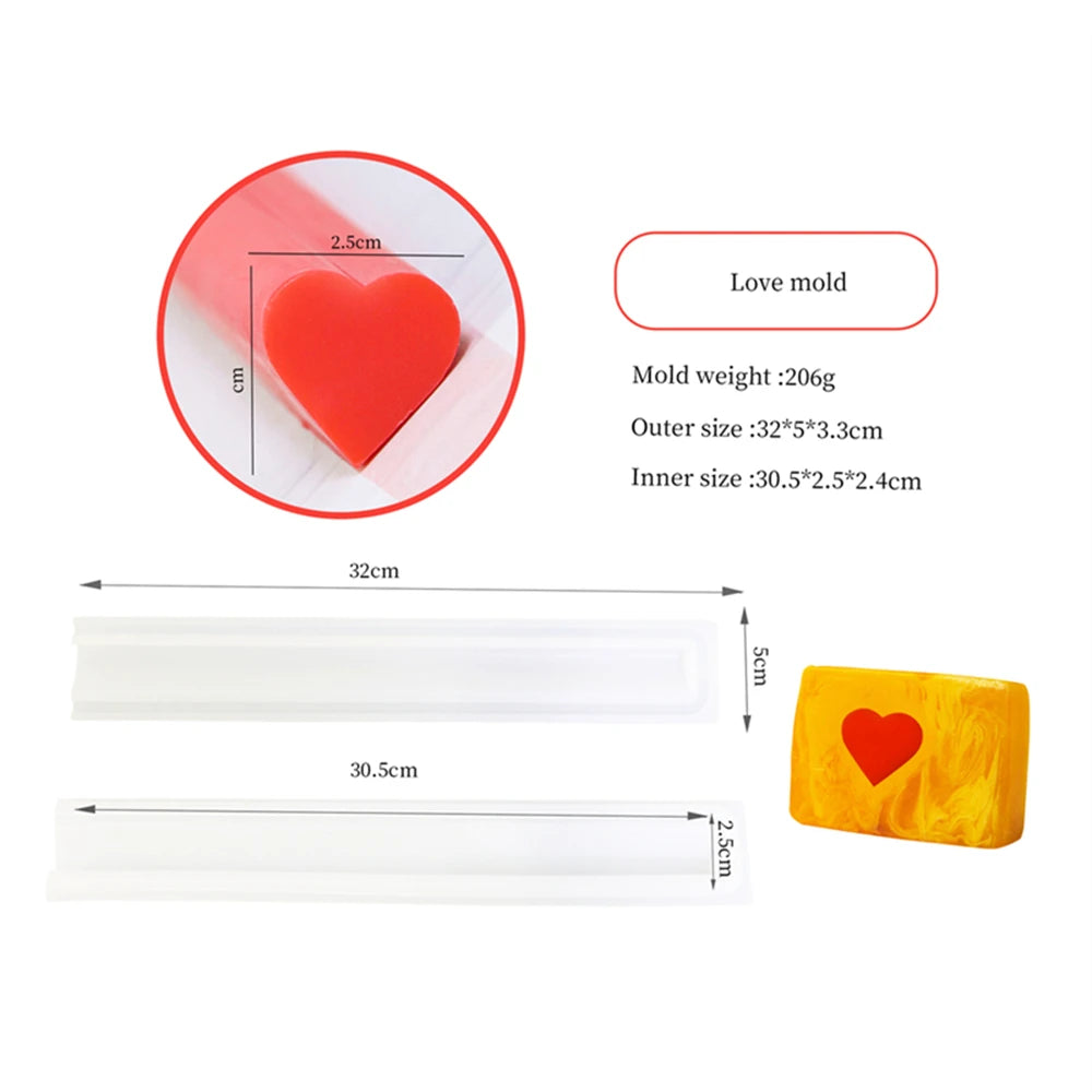 A red heart silicone mold for soap or candles, shown with dimensions and a yellow molded piece.