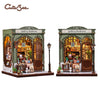 A detailed 3D wooden book nook kit featuring a gallery bookstore facade with intricate details and LED lighting.