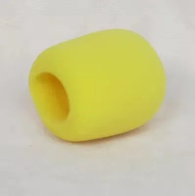A yellow foam windscreen pop filter cover shaped like a cylinder.