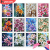 A collection of watercolor paintings featuring various lily flowers in pink, white, orange, and purple hues.