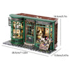 A miniature dollhouse set depicting a magical wand shop with glass display cases and wooden accents.