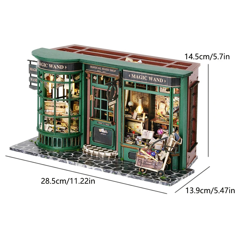 A miniature dollhouse set depicting a magical wand shop with glass display cases and wooden accents.