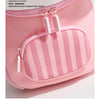 Pink mini backpack with a striped pocket and white zipper pulls