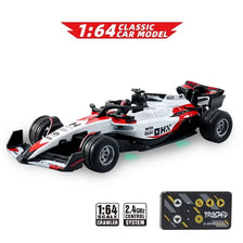 A white and red 1:64 classic car model racing on a surface, with technical specifications visible.