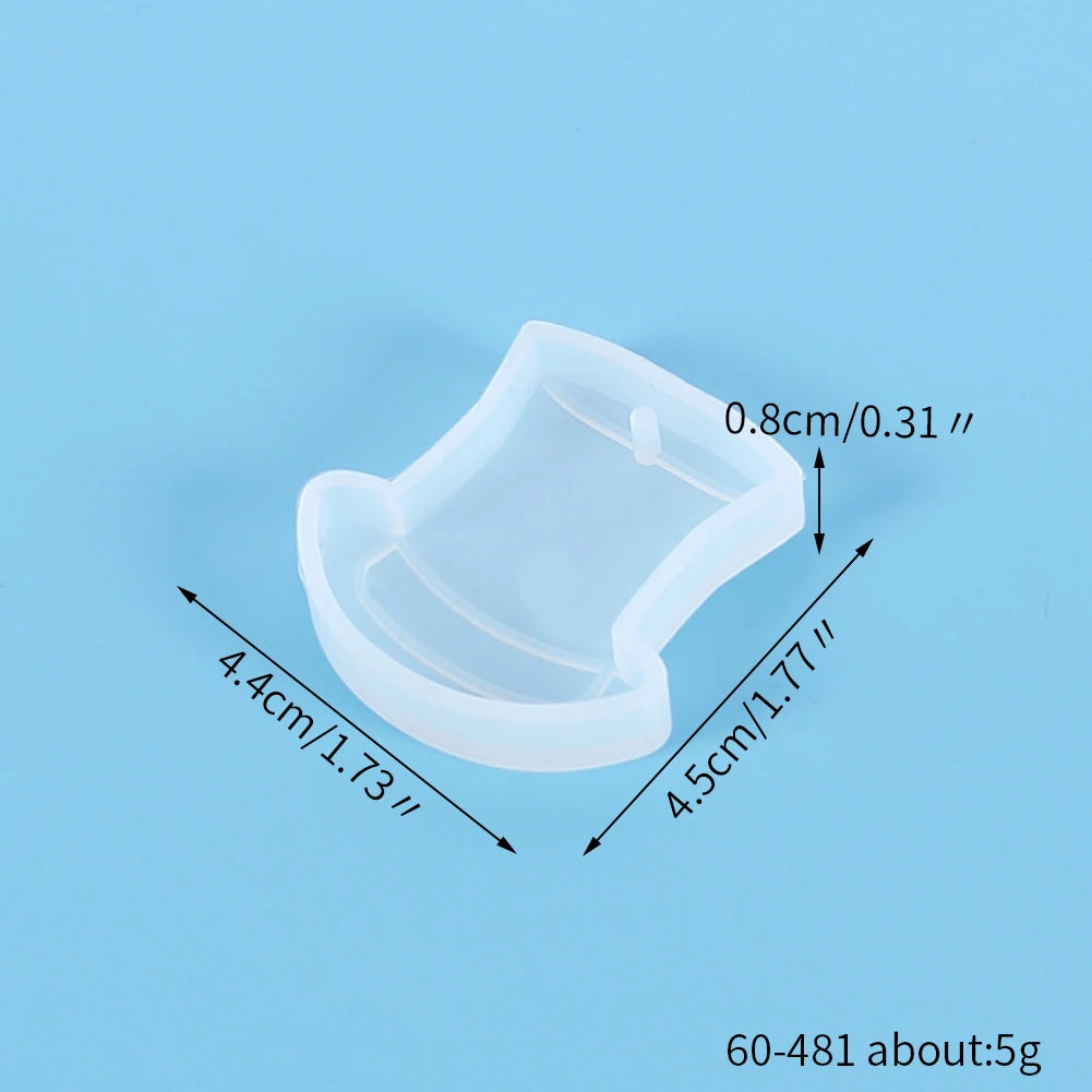 A clear silicone mold with dimensions 4.4cm by 4.5cm used for jewelry and craft projects.