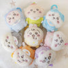 A collection of cute plush keychains featuring characters like Usagi, Hachiware, and JiYi in various pastel colors.