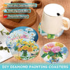 An assortment of eight diamond painting coasters featuring floral designs and a metal holder.
