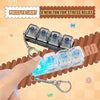 A hand holds a clear LED keyboard keycap fidget keychain designed for stress relief.