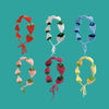 A collection of handmade strawberry crochet headbands in various shades of red, green, and blue.