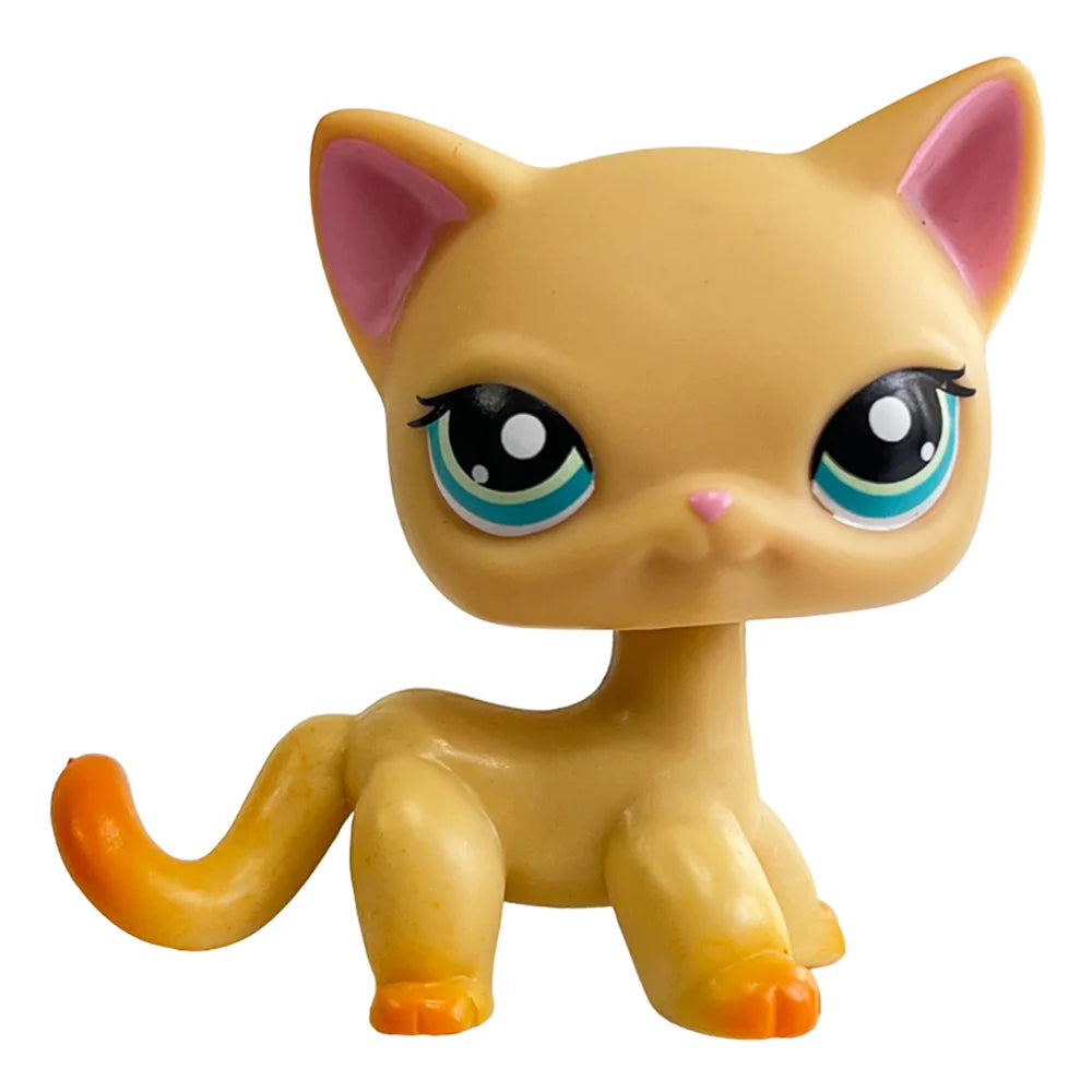 Sammler-Katzenfigur mit hellgelbem Fell und rosa inneren Ohren.