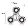 Silver aluminum alloy fidget spinner with four bearing holes and dimensions marked.