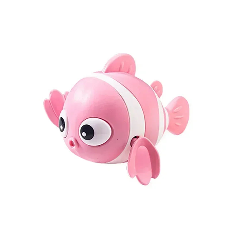 Rosa und weißes mechanisches Fischbadspielzeug für Babys mit großen Augen und Flossen