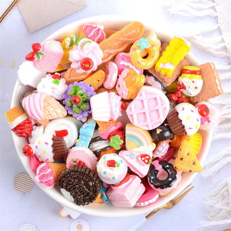 A bowl filled with assorted colorful candy resin flatbacks and candies for DIY crafts