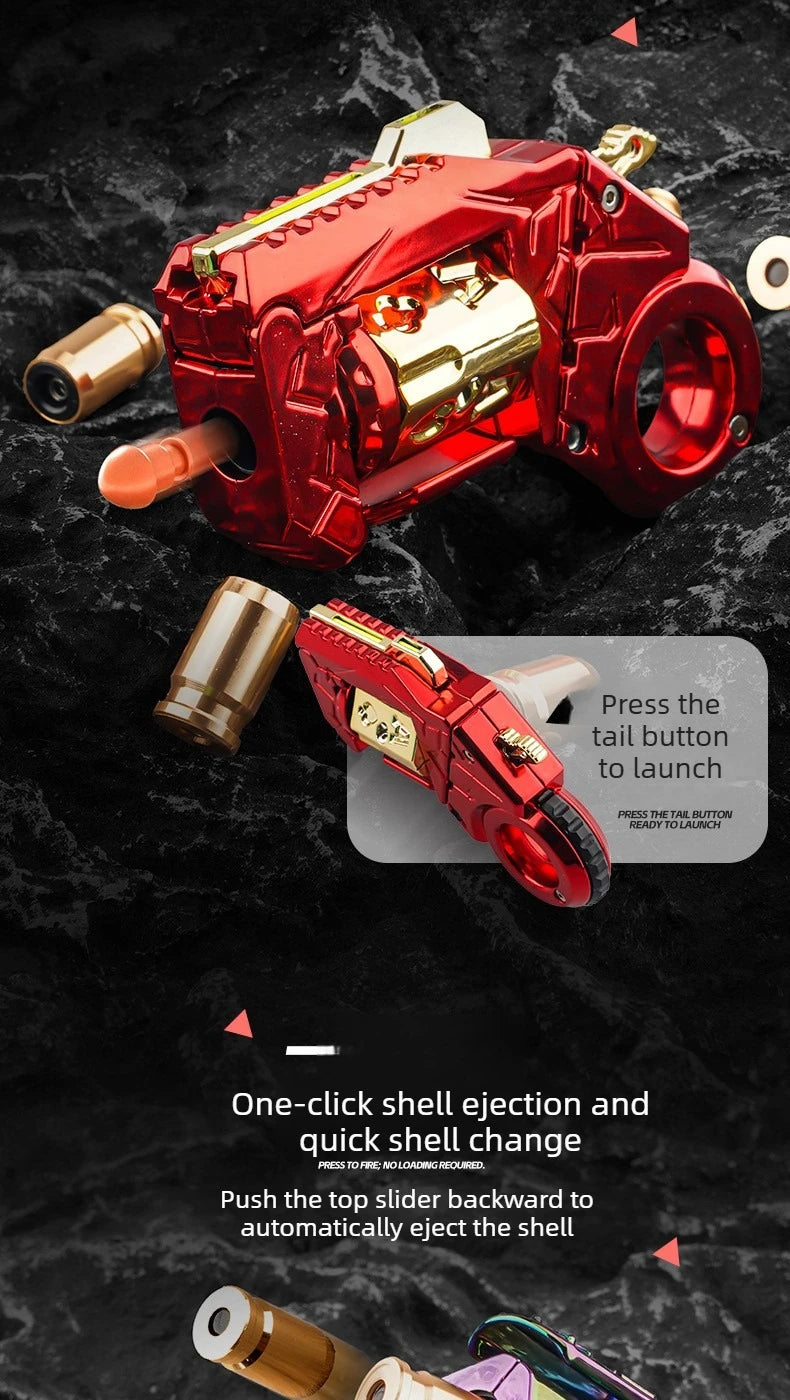 A red alloy fidget toy gun is shown with a shell ejection mechanism and a top slider for quick shell change.