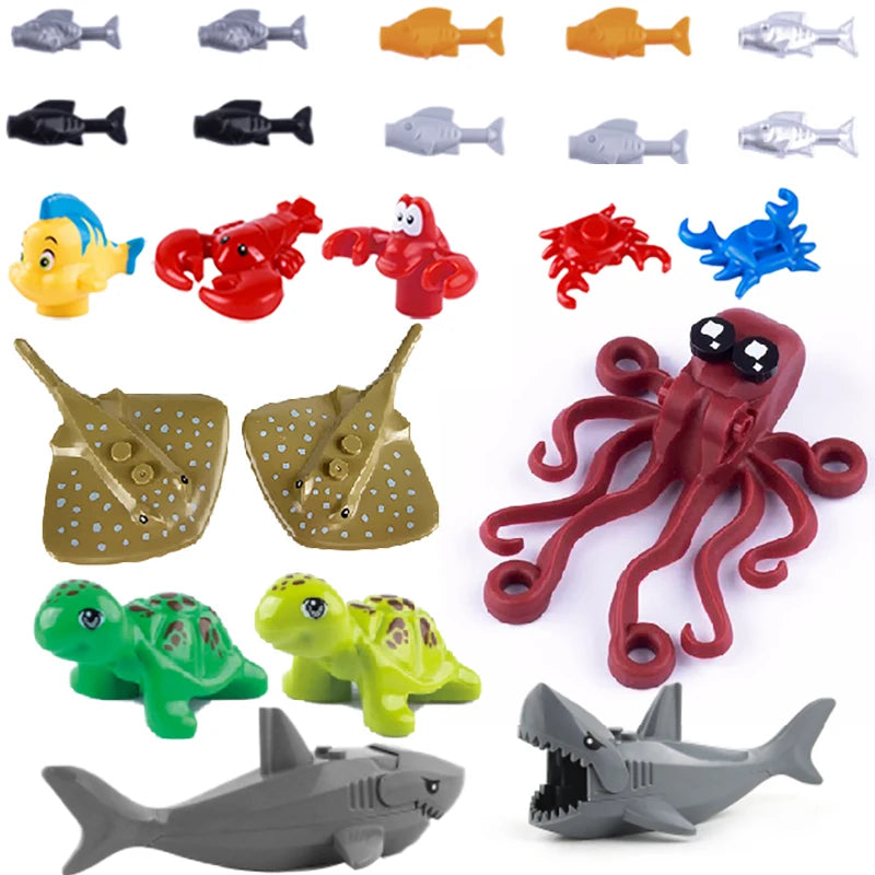 A collection of marine animal building blocks including a shark, octopus, and whale in various colors.