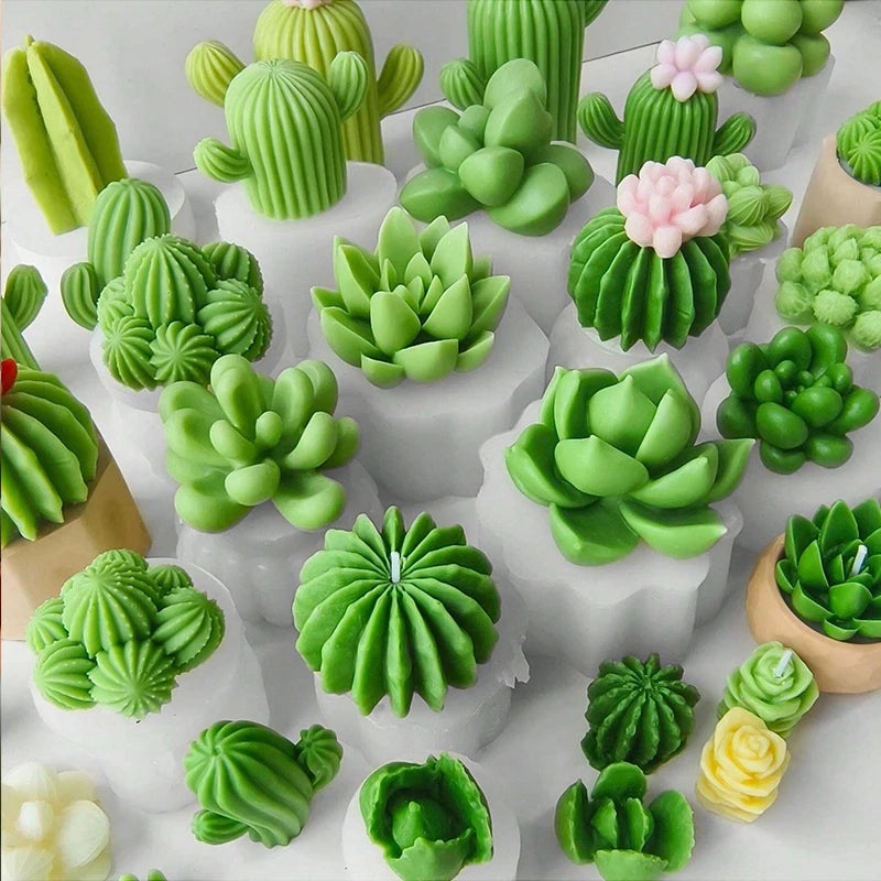 A collection of green silicone molds shaped like various cacti and succulents for crafting.