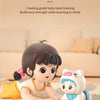 A baby doll is shown crawling on a mat next to an interactive toy pig.