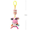 A pink and white plush animal hanging rattle toy with a yellow ring and striped fabric.