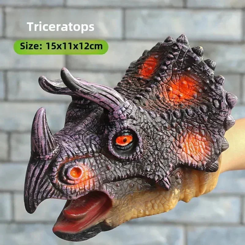 A realistic gray Triceratops dinosaur head hand puppet with textured scales and orange eyes.