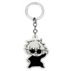 Silver keychain featuring a black silhouette of an anime-style character with large sunglasses.