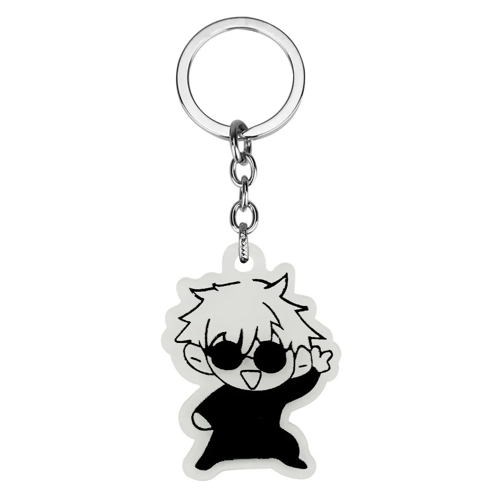 Silver keychain featuring a black silhouette of an anime-style character with large sunglasses.