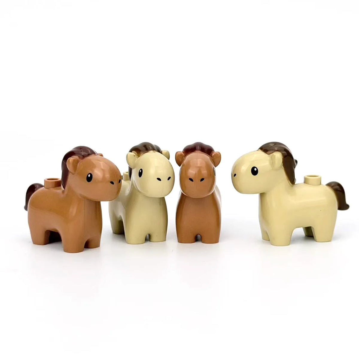 A set of six African wildlife animal building blocks in brown, beige, and tan colors.