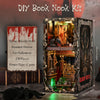 A DIY book nook kit featuring a detailed haunted hotel scene with intricate decor and lighting.
