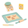 A wooden pretend play kitchen set featuring a coffee maker, tea accessories, and a wooden spatula on a light green tray.