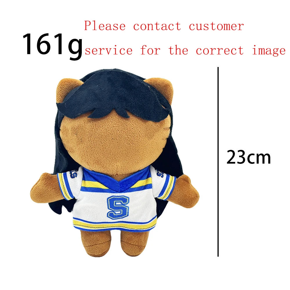 A plush doll resembling Eminem, XXXTentacion & Frank Ocean with dark hair wearing a white and blue sports jersey.