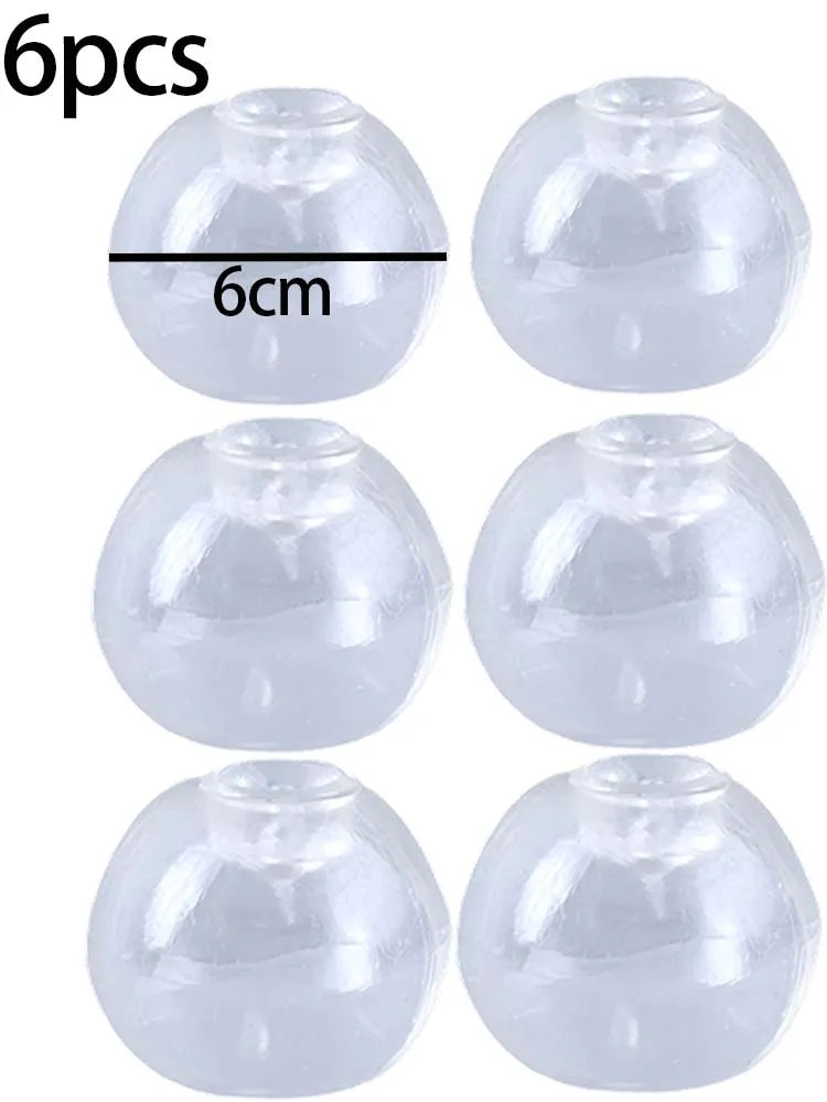 A set of six clear, translucent silicone squeeze balls used for stress relief, with a measurement line indicating 6cm.