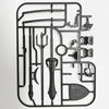 A black magnetic multi-jointed action figure building set with various tools and a display stand.