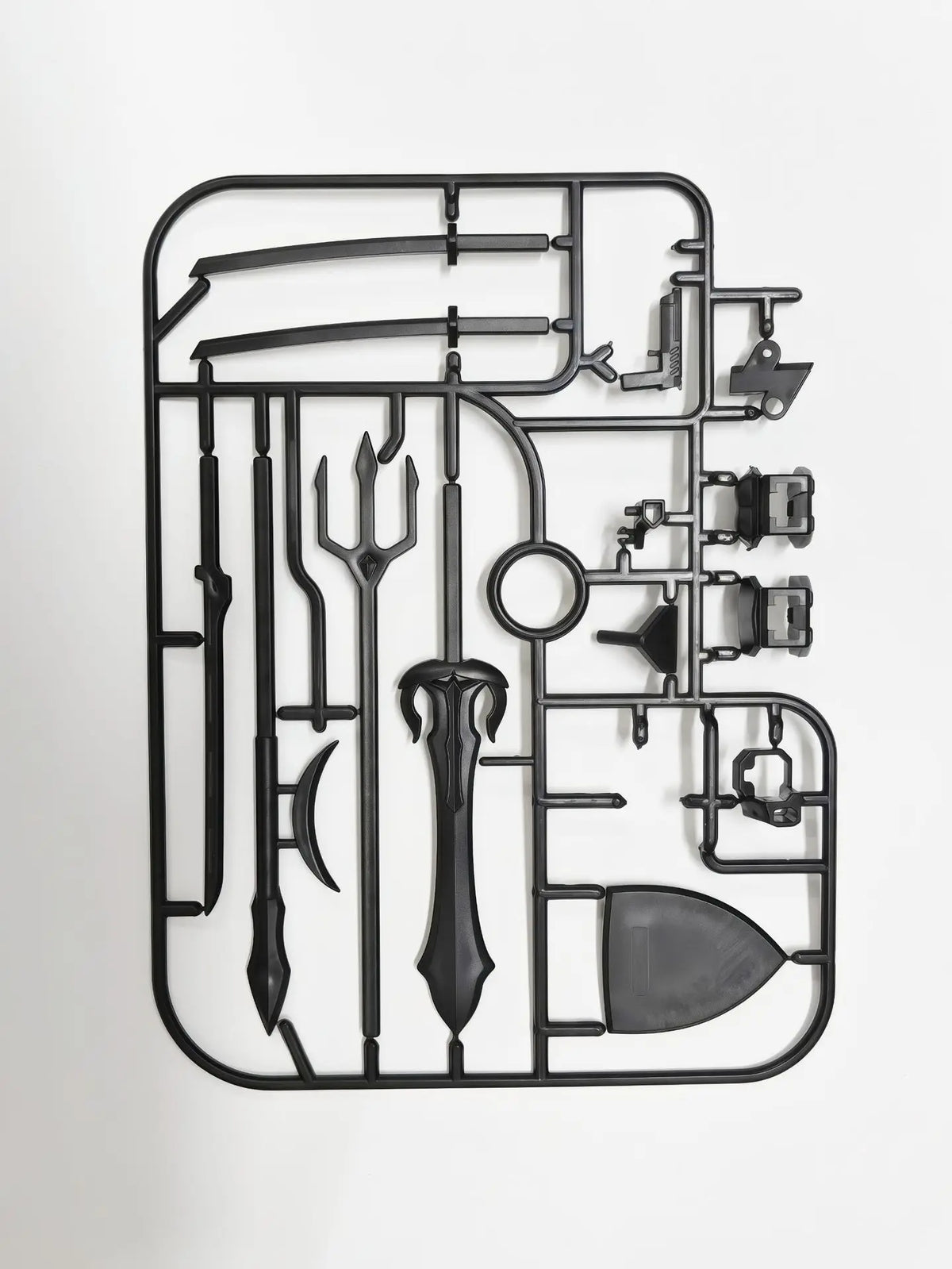 A black magnetic multi-jointed action figure building set with various tools and a display stand.
