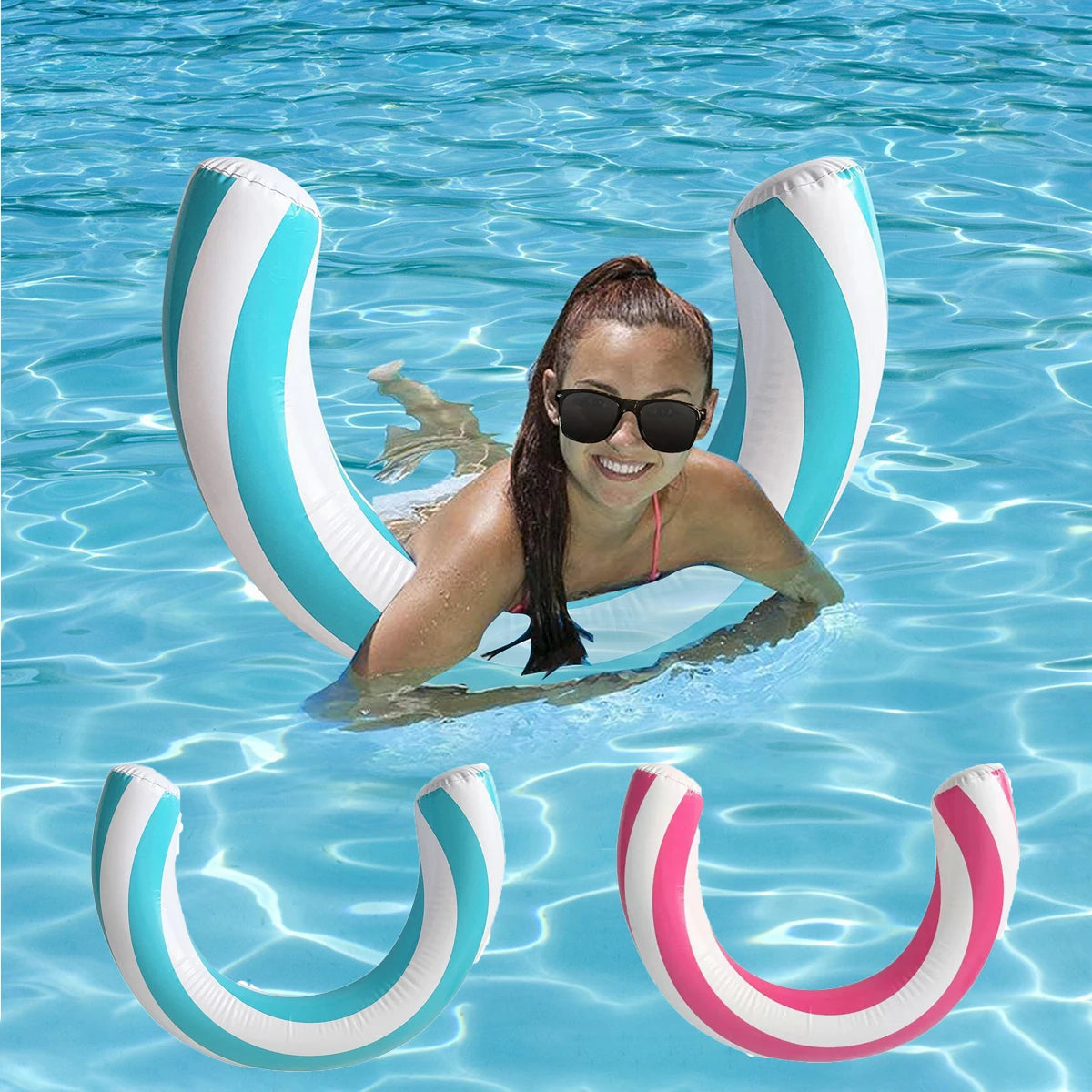 A woman floating in clear blue water surrounded by striped inflatable U-shaped pool floats.
