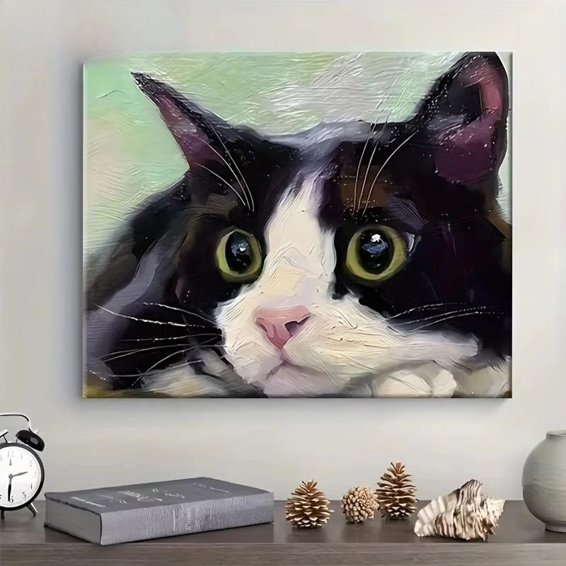 A painting of a black and white cat's face, featuring expressive green eyes.