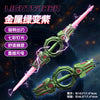 A green lightsaber with a pink blade and fire effects, shown in a close-up view.