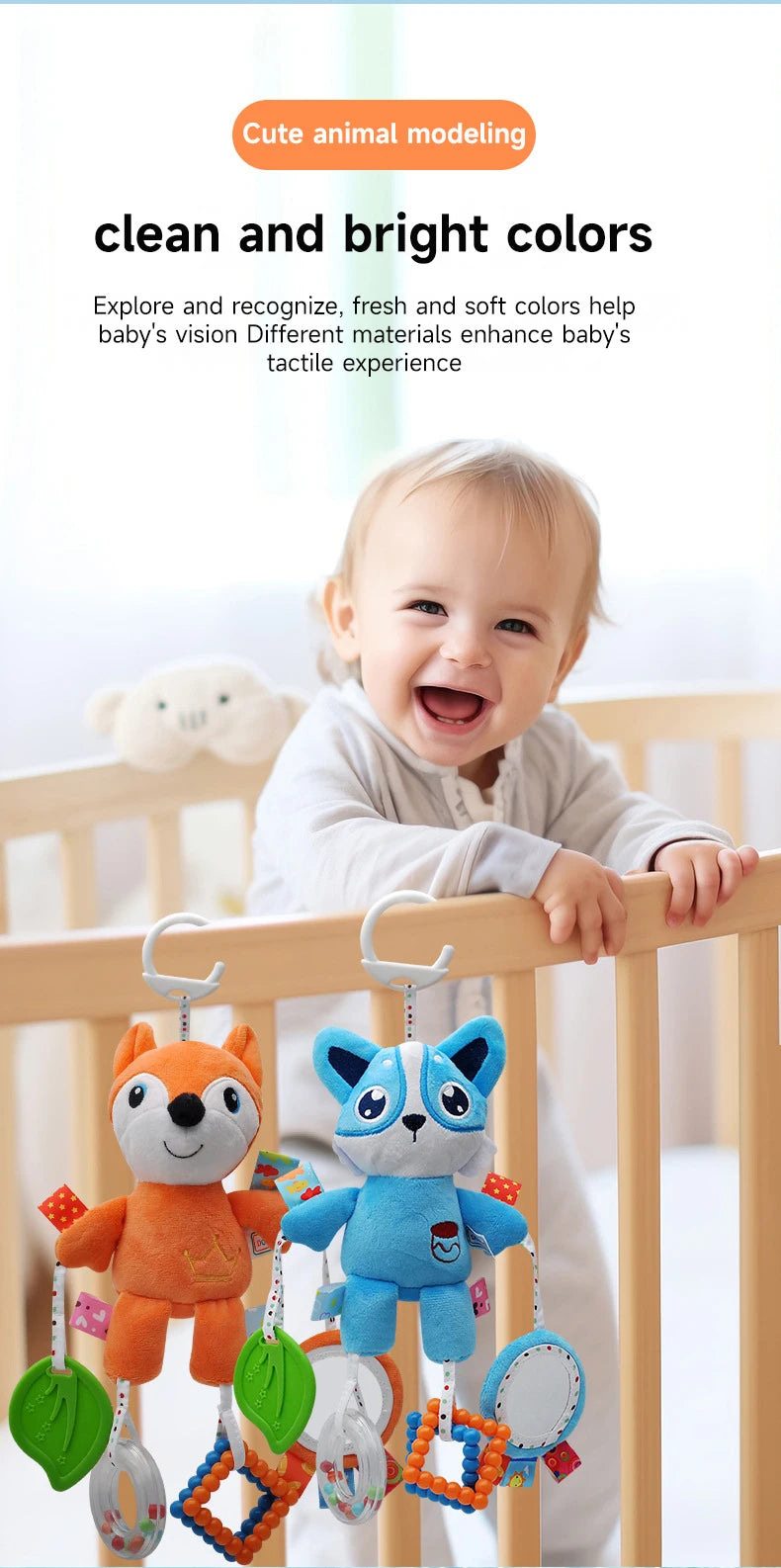 Two plush animal toys, an orange fox and a blue dog, are hanging from a wooden railing.