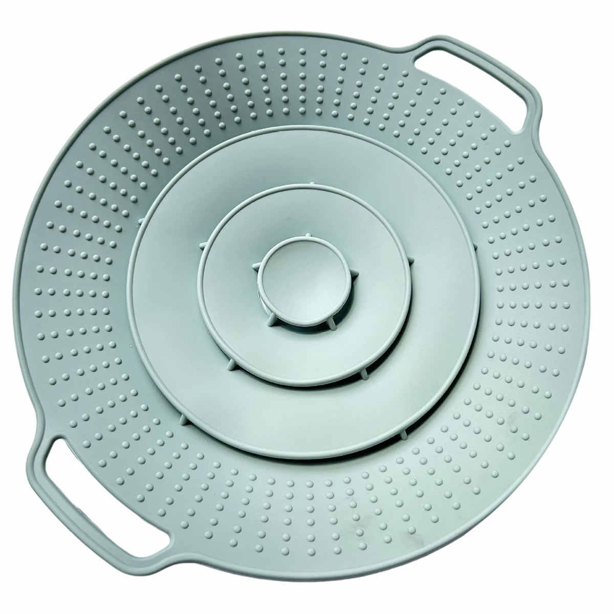 A round, light gray silicone spill stopper lid with multiple drainage holes and handles.
