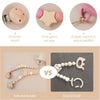 Comparison of a smooth wood star pacifier clip with silicone beads versus an easy-to-break version.