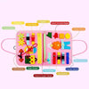 A pink Montessori felt activity busy book for toddlers featuring a dinosaur theme with various zipper and buckle closures.