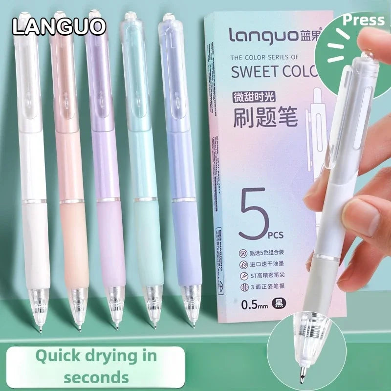 A set of five colored Languo gel pens with smooth 0.5mm tips shown in a box and being held by a hand.