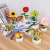 A collection of colorful rose flower building blocks and nature-themed accessories displayed on a wooden surface.