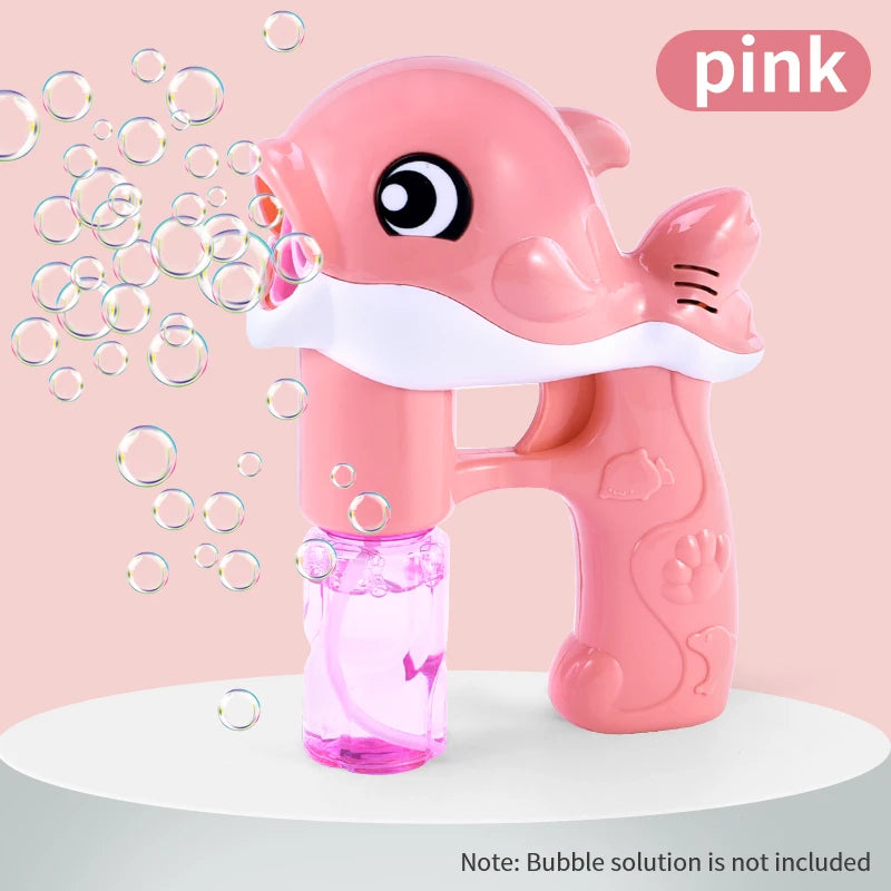 A pink whale bubble gun toy is shown against a light background with bubbles flying out.