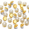 A collection of gold and silver rhinestone pearl beads for jewelry making and DIY crafts.