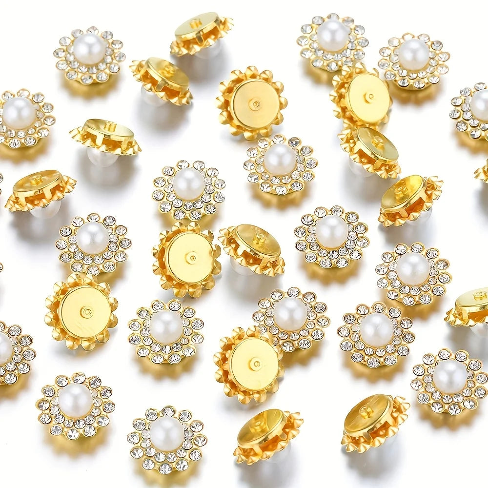 A collection of gold and silver rhinestone pearl beads for jewelry making and DIY crafts.